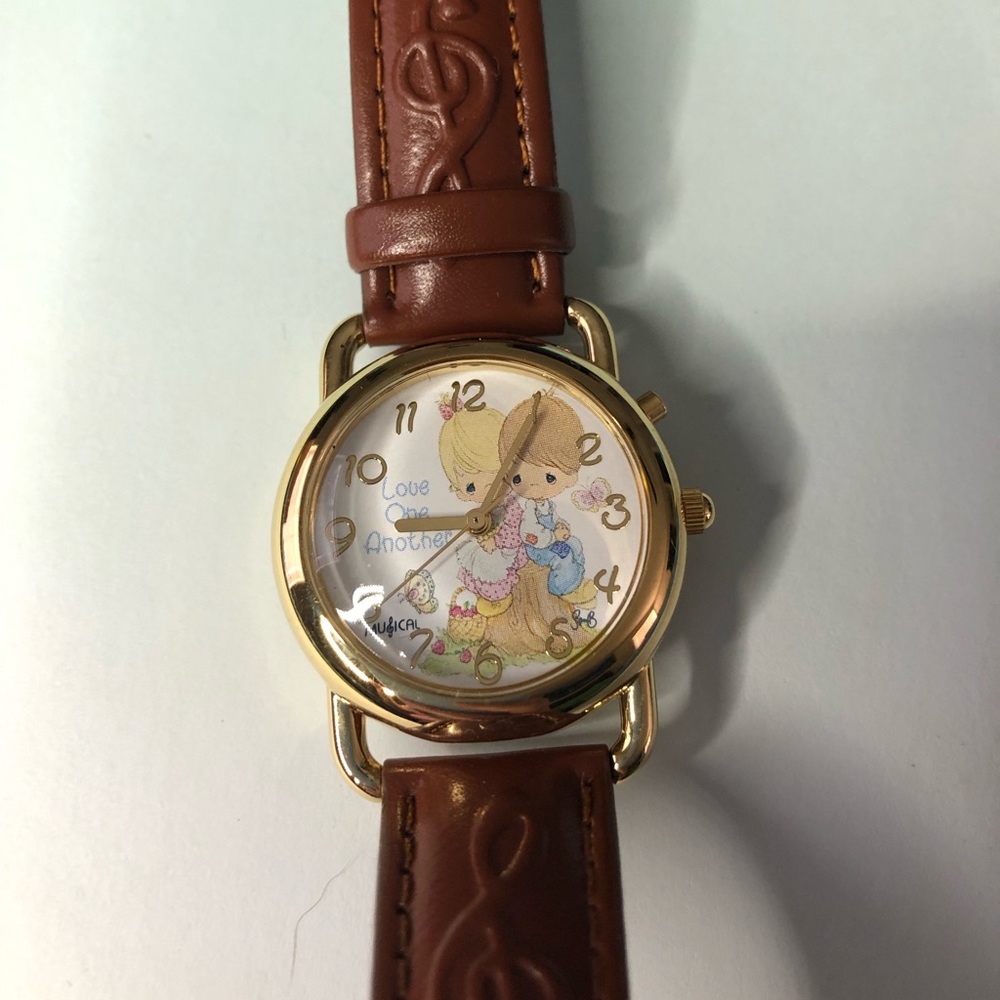 Musical precious moments watch
